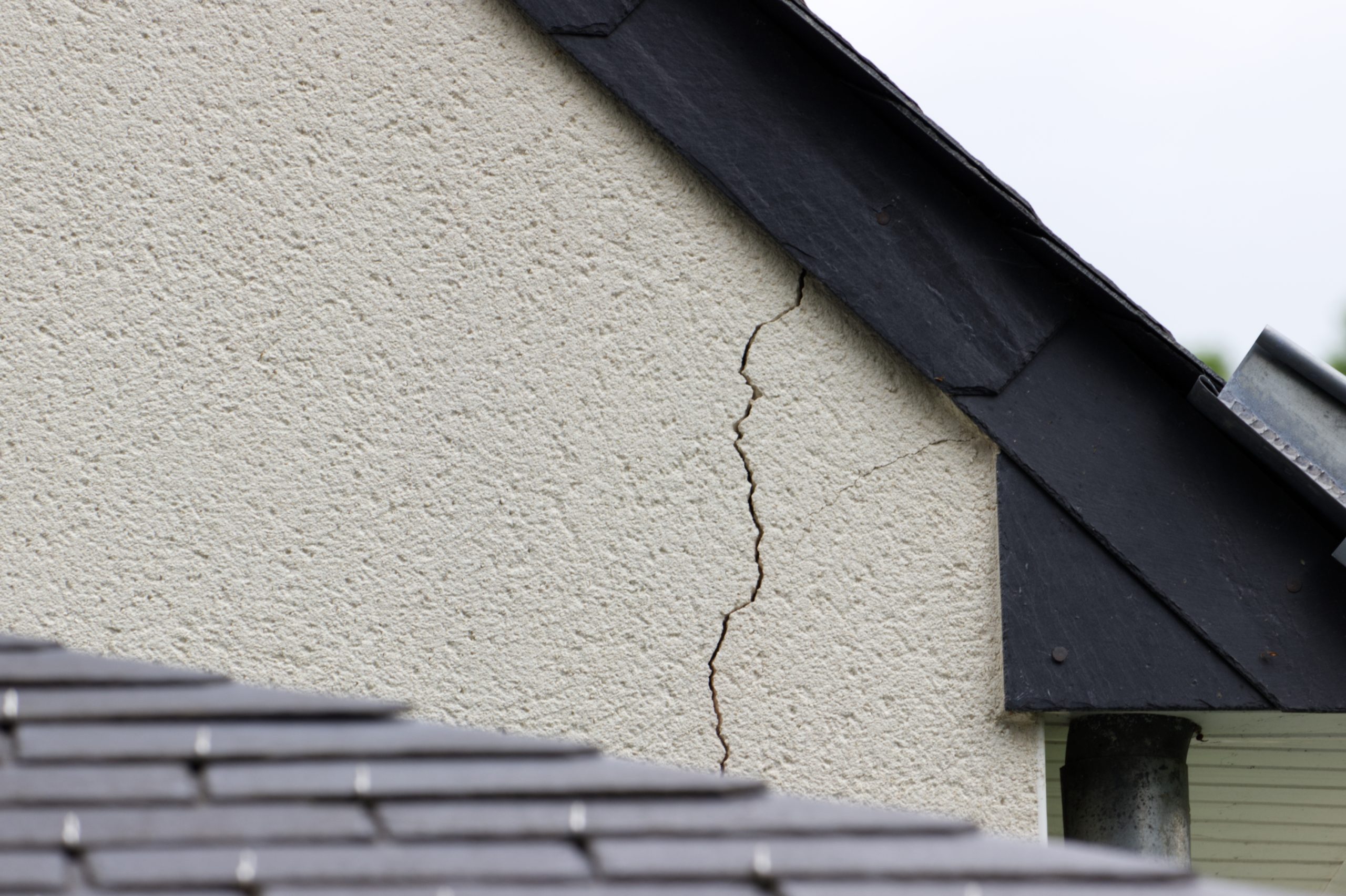 Large crack on the side of a house