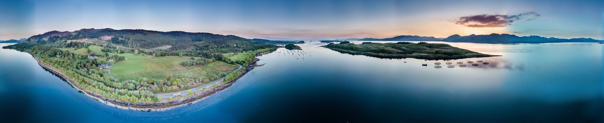 Aerial view of coast by Appin with views over Shuna Island and Arnamurchan, Scotland