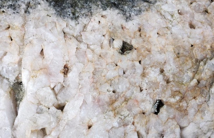 Coarse white quartz background Coarse white quartz stone - rock crystal - abstract background texture