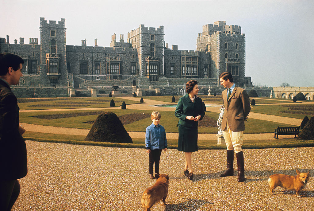 Princes Charles, Edward with Queen Elizabeth with dogs