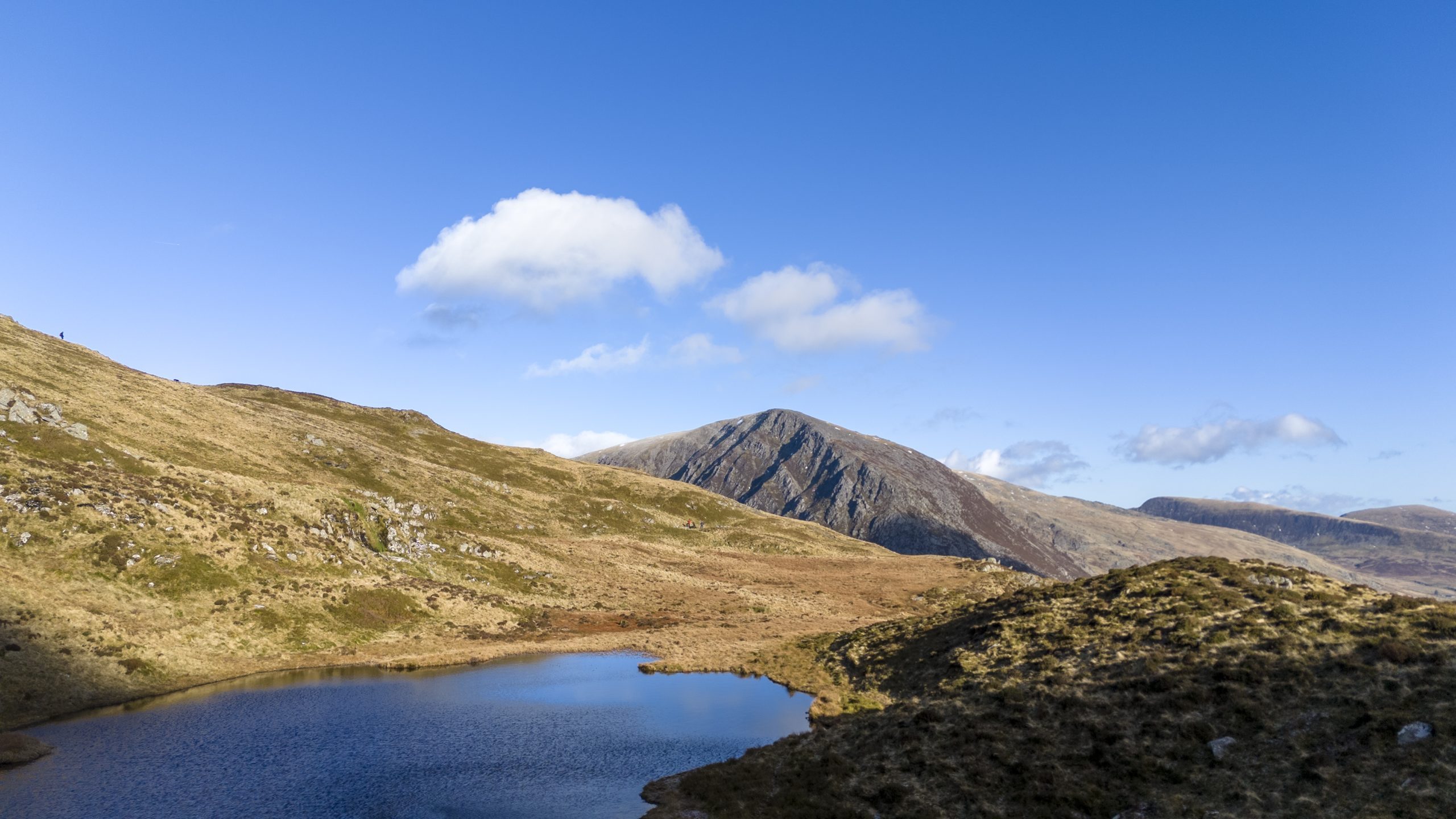 High up in Cwm Idwal looking towards the Ogwen Valley and Pen Yr Ole Wen. Taken on a bright winters day with vibrant blue sky and gorgeous light.