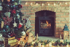 Christmas setting, decorated fireplace, fur tree Christmas setting, decorated fireplace, fur tree
