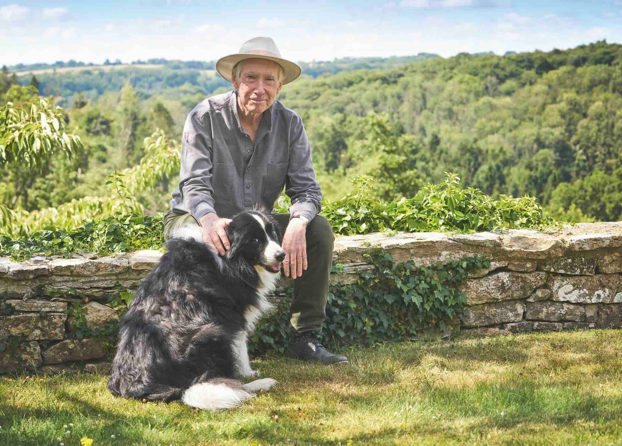 Author Ian McEwan in his Cotswold garden with his late Border collie Rab