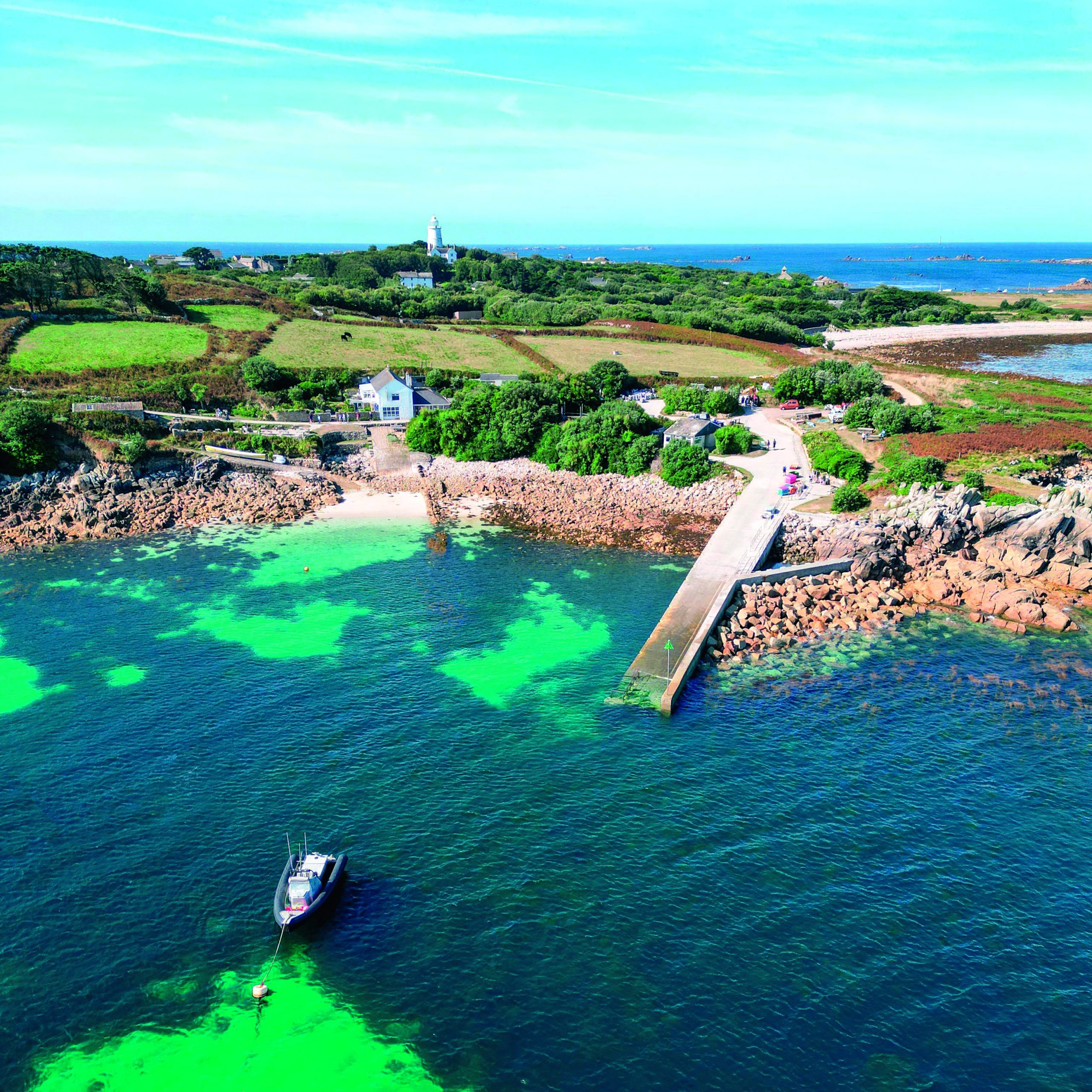 An aerial shot of the shore of the sea and the fishing boat, St Agnes, Isles of Scilly 