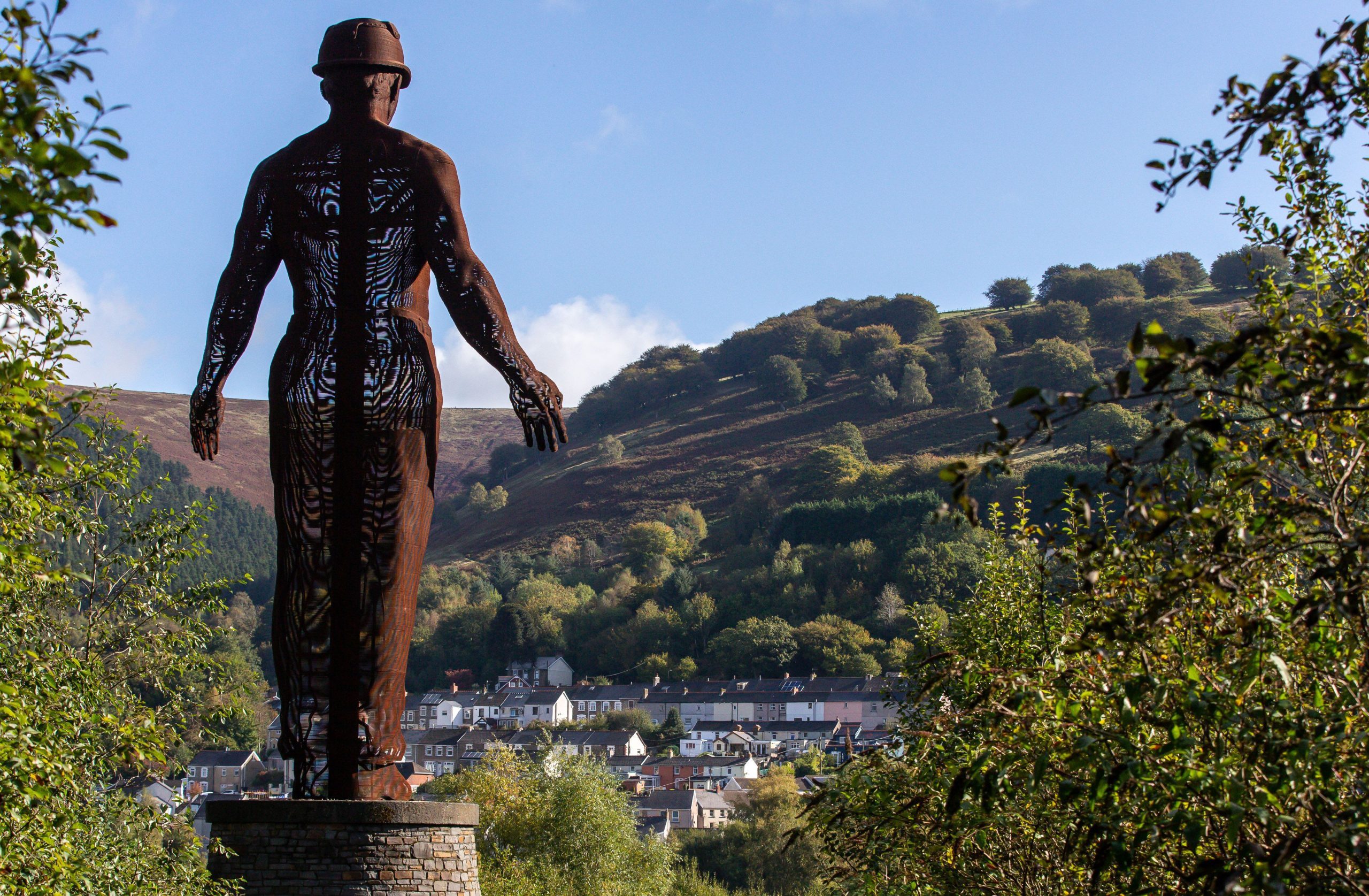 ABERTILLERY, WALES - OCTOBER 01: A general view of the Guardian in Six Bells Abertillery which is a located within the borough of Blaenau Gwent on October 1. 2020, in Abertillery, Wales, United Kingdom. A case rate of 307.7 positive Coronavirus results per 100,000 in the week to 26 September was reported by Public Health Wales in Blaenau Gwent, at the time the highest figures in Wales and second highest in the UK. The Guardian is a memorial built to remember miners lost in the Six Bells Colliery Disaster in 1960. (Photo by Huw Fairclough/Getty Images)